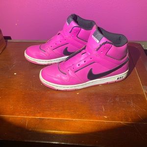 One of a kind hot pink high top Nikes